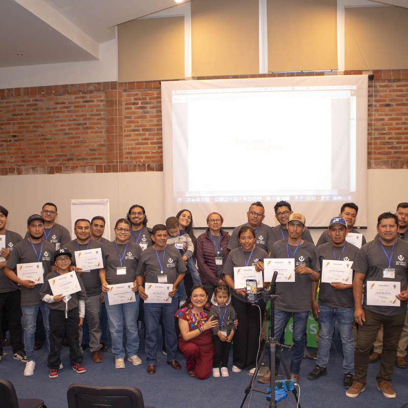 Group of workers with certificates